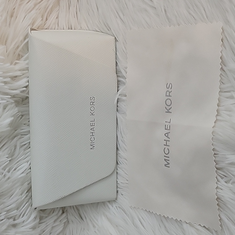 NWOT Michael Kors glasses case with cleaning cloth comes with it.